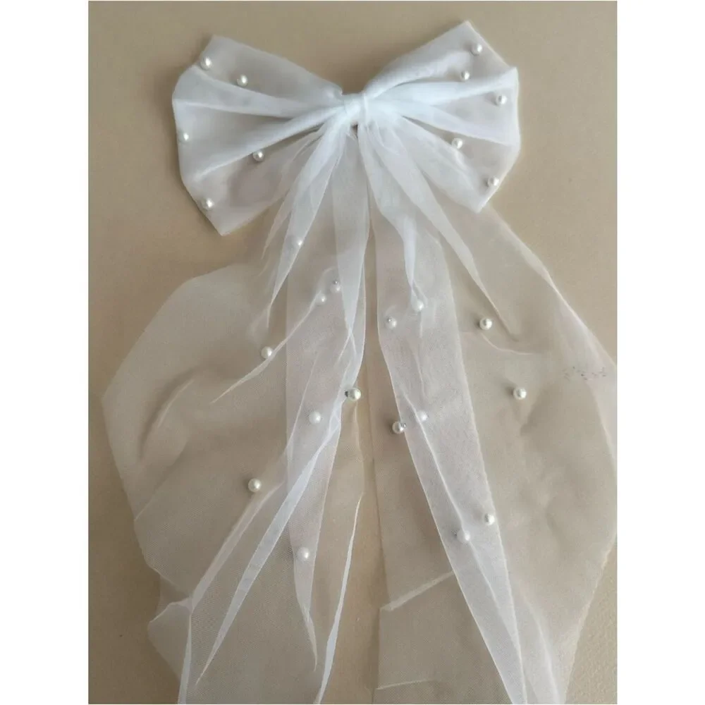 Pearl hair bow K46